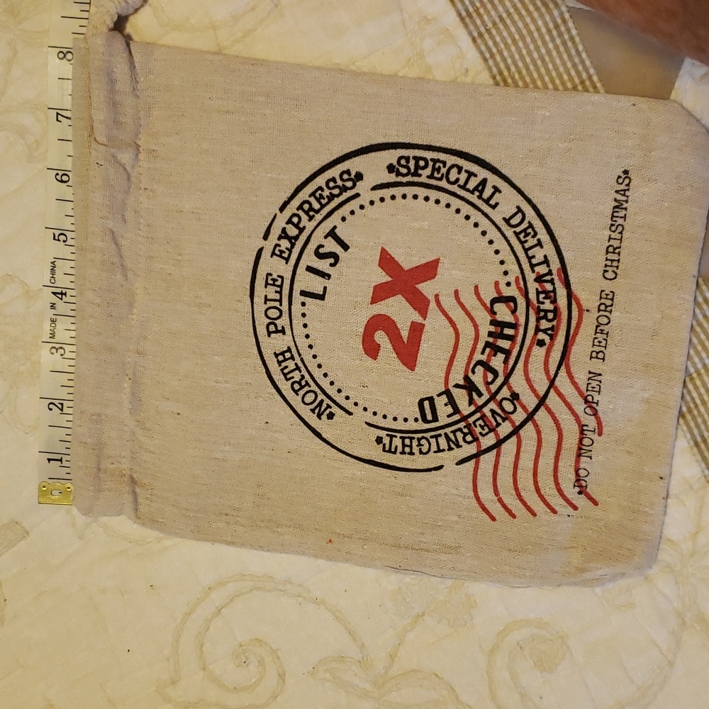 New cute Christmas gift bags. Durable fabric. Draw string.
